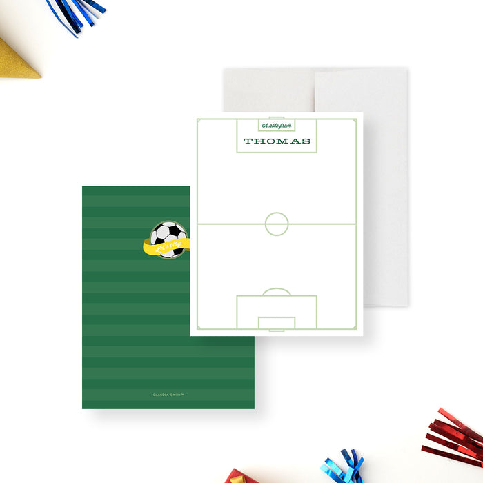 Personalized soccer thank you cards with a field outline on the white writing front and a soccer ball on the green striped reverse.