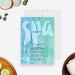 Spa birthday invitation template featuring a blue and green watercolor design with large spa lettering, ideal for girls pamper party celebrations.
