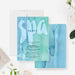 Spa birthday invitation featuring a soft blue and green watercolor background with modern lettering, designed for a relaxing girls spa party-front-back