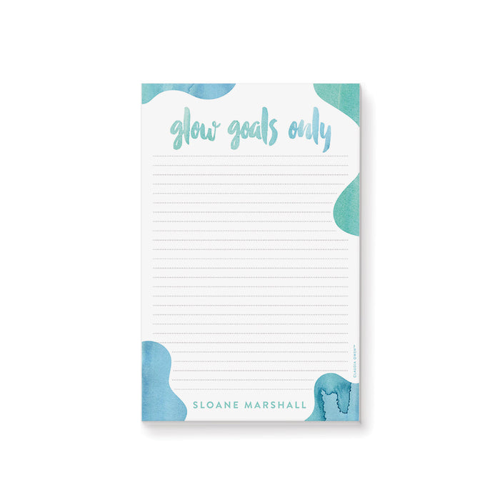 Personalized spa party notepad featuring a soft blue and green watercolor design with “glow goals only” lettering and custom name.