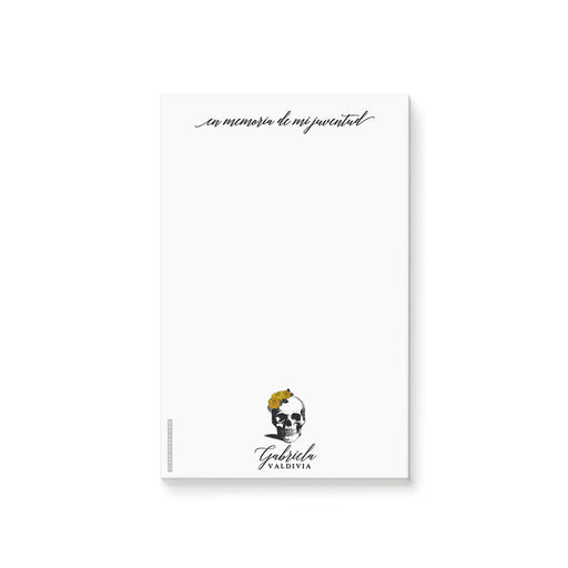 Gothic notepad with skull and marigold flowers and Spanish text “En memoria de mi juventud” for a Day of the Dead themed birthday.