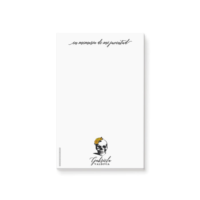 Gothic notepad with skull and marigold flowers and Spanish text “En memoria de mi juventud” for a Day of the Dead themed birthday.