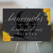 Gothic birthday welcome sign featuring a vintage skull, Spanish lettering, and marigold flowers for a Death to My 20s or Day of the Dead themed celebration.