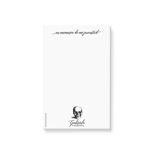 Spanish gothic skull notepad with the phrase “En memoria de mi juventud” for a Death to My 20s themed birthday party.