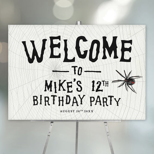 Spooky spider web birthday party welcome sign with black lettering and spider illustration