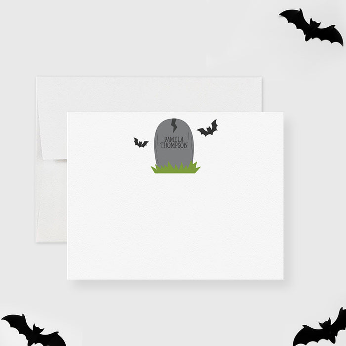 Halloween-themed stationery set with a gray tombstone and bats on a white background