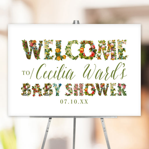 Personalized floral baby shower welcome sign with custom name and date, decorated with vibrant flower-filled letters.