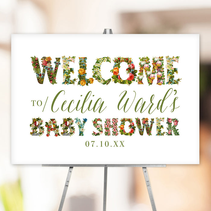 Personalized floral baby shower welcome sign with custom name and date, decorated with vibrant flower-filled letters.