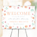 Floral welcome sign with soft pastel flowers illustration, ideal for spring event entrances and party decorations.
