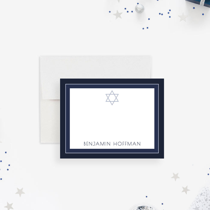 Personalized note card with a white front with a navy and printed silver frame, Star of David, and personalized name. Shown with a white envelope.