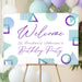 Birthday welcome sign with purple and teal geometric shapes and modern script text for a stylish party entrance