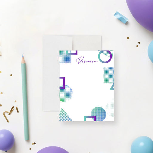 Personalized note card with purple and teal geometric shapes and custom name on a clean modern layout-front