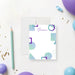 Personalized note card with purple and teal geometric shapes and custom name on a clean modern layout-front