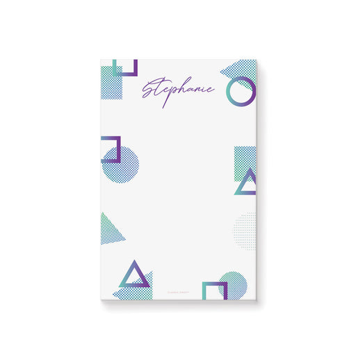 Personalized notepad with purple and teal geometric shapes and custom name in elegant script.