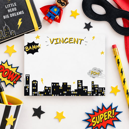 Kids superhero note card with cityscape and comic book design