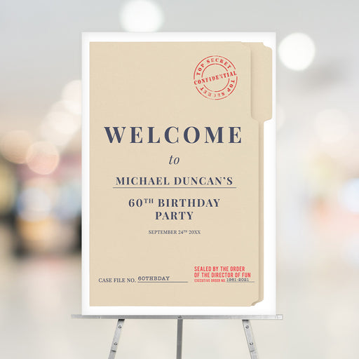 Top Secret–style welcome sign on easel, personalized with name and date for milestone birthdays, retirements, and themed parties.