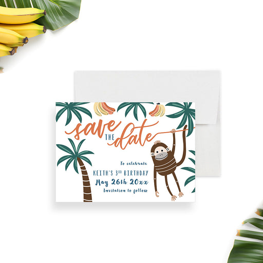 Jungle birthday save the date card featuring a playful monkey swinging from a vine with palm trees and bananas in a tropical kids party design-front
