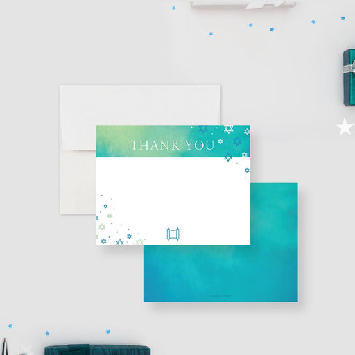 Personalized mitzvah thank you cards with a Torah scroll, small Stars of David and teal details on the white front and a teal watercolor reverse.