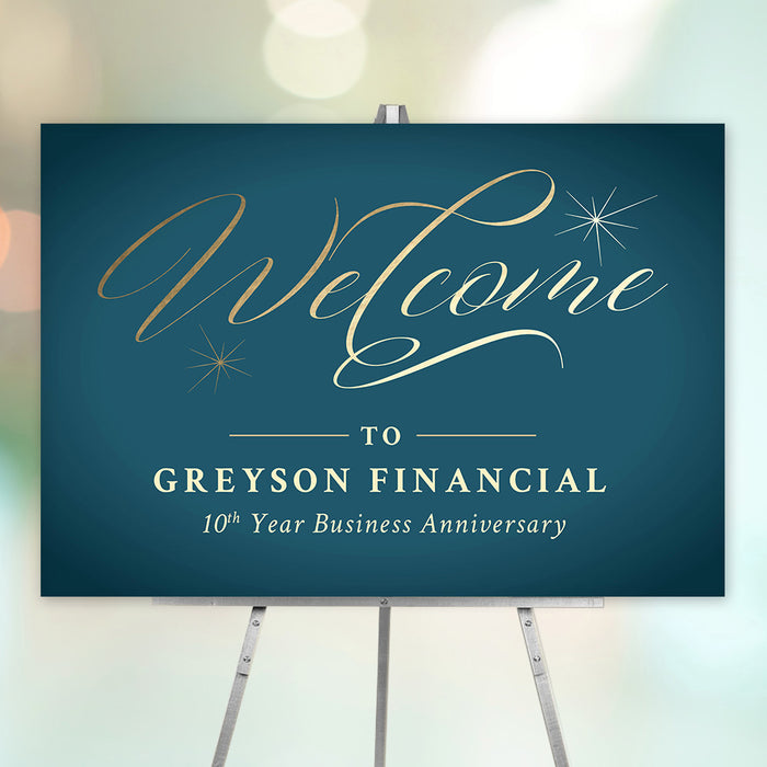 teal and gold-style corporate anniversary welcome sign with elegant script lettering for a formal business dinner event