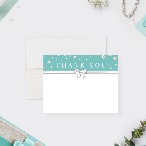 teal thank you card with pearl accents, white bow design, and blank space for business appreciation notes-front
