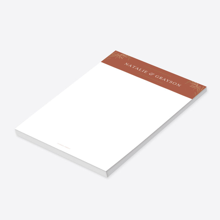 Personalized terracotta wedding notepad with gold foliage header and custom couple names-side