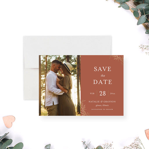 Terracotta wedding photo save the date card with gold botanical accents and warm rustic design-front