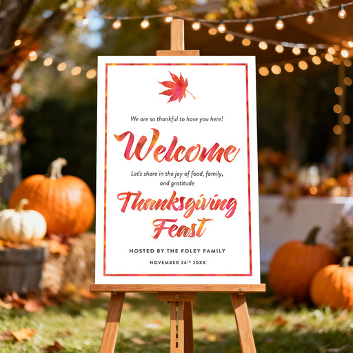 thanksgiving welcome sign with watercolor autumn leaves displayed on an easel for a fall celebration