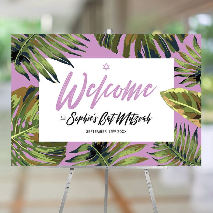 Tropical Bat Mitzvah welcome sign with vibrant palm leaves and a Star of David on a soft lilac background, ideal for venue décor or party display.