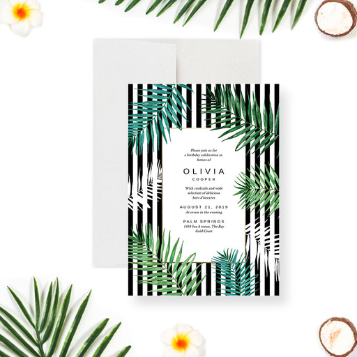Tropical birthday invitation with green and teal palm leaves over black and white stripes.