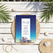 Tropical birthday party invitation featuring blue ombre background and palm tree design