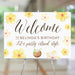 Tropical welcome sign with yellow lumeria flowers and coconut drink illustration for birthday party and summer island-themed event.