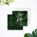 tropical birthday save the date card with a dark green monstera leaf and modern white typography for cocktail parties and summer events-front-back