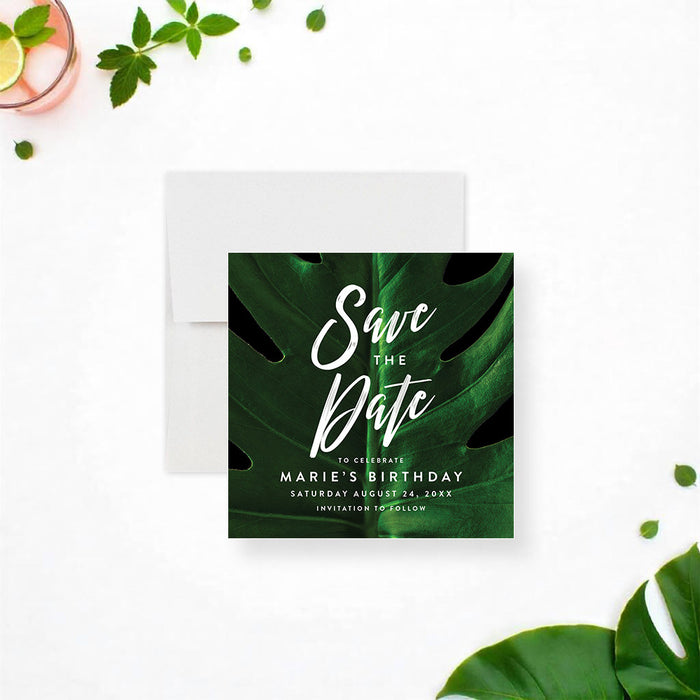 tropical birthday save the date card with a dark green monstera leaf and modern white typography for cocktail parties and summer events-front