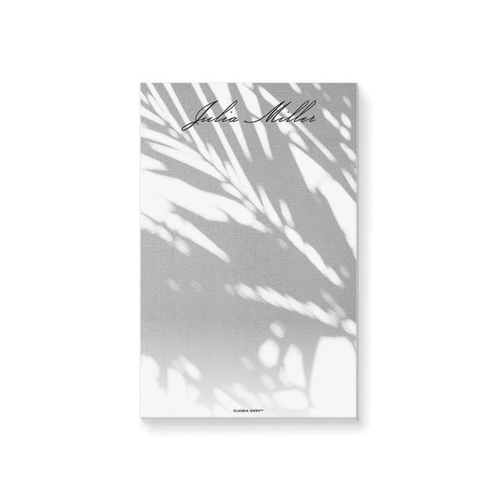 personalized palm shadow notepad with soft tropical leaf shadow design and custom name for a beach or garden wedding gift