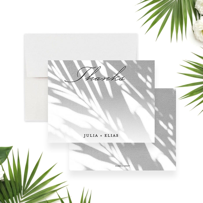 tropical wedding thank you card with soft palm shadow design and elegant script lettering for a beach or garden wedding-front-back
