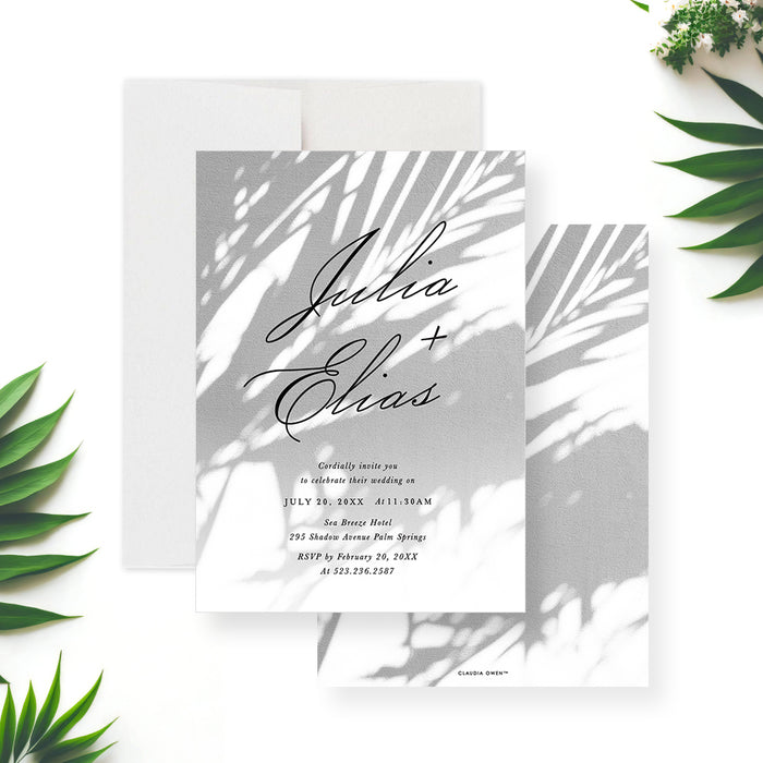 tropical palm wedding invitation with soft palm shadow design and elegant script lettering for a garden wedding-front-back