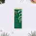 tropical wedding ticket invitation with an emerald green background and elegant palm fronds for beach weddings and destination celebrations