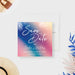 tropical pool party save the date card with colorful sunset background and palm leaf accents-front