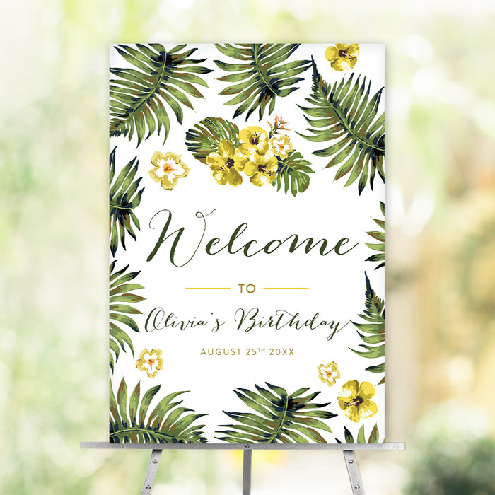tropical spa party birthday welcome sign with green palm leaves, yellow hibiscus flowers, personalized birthday text, and easel display