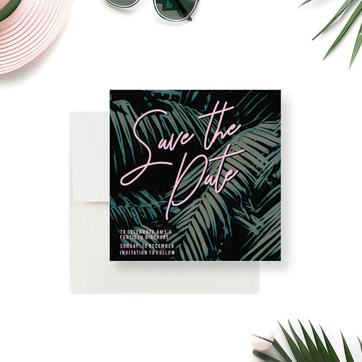 tropical save the date card with dark palm leaf background and pink typography for a summer beach birthday celebration-front