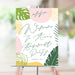 Bachelorette party welcome sign featuring a tropical leaves illustration