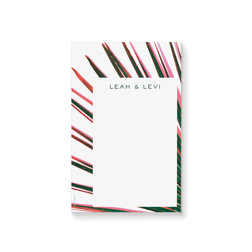 Tropical personalized notepad with pink and green palm fronds, a unique stationery keepsake for guests or couples.