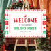 holiday party welcome sign featuring a red, green, and white ugly Christmas sweater pattern with reindeer and festive holiday motifs