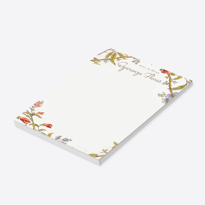 Personalized botanical notepad featuring vintage floral illustrations with elegant script name at the top, perfect for stationery and gifts-side