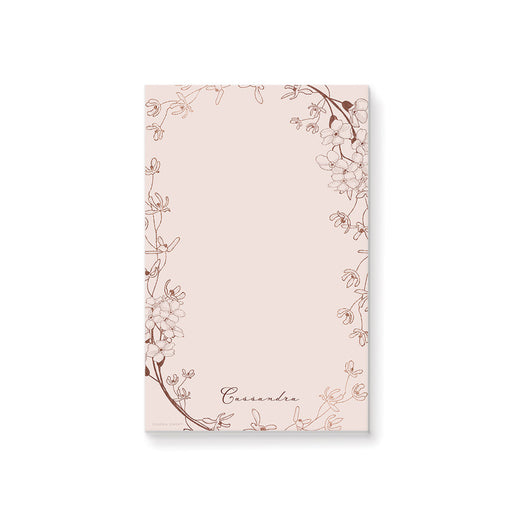 personalized blush pink floral notepad with custom name and vintage botanical wreath design for notes, gifts, and planning.