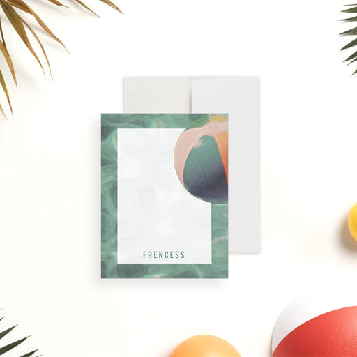 Personalized pool party note cards with a beach ball beside the white writing panel and a green watercolor pool pattern on the reverse.