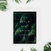 Elegant tropical wedding invitation featuring botanical palm leaves and a gold frame-front