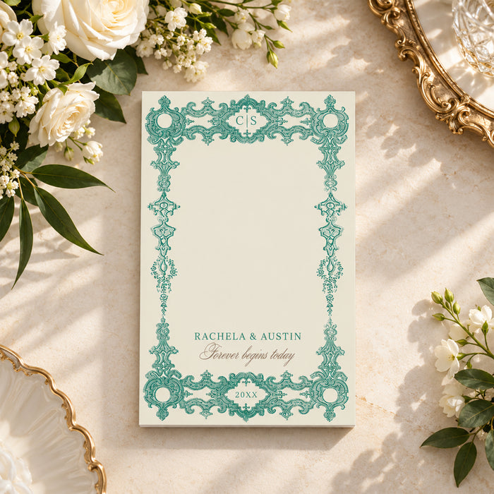 Vintage green baroque personalized wedding notepad with an intricate filigree border and monogram design on an ivory background.