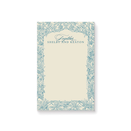 Vintage blue botanical personalized wedding notepad with a floral border and custom names on an ivory background