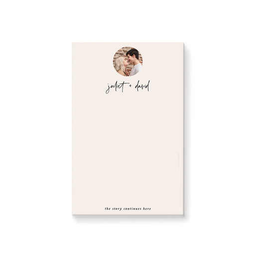 Personalized beige photo notepad featuring a couple’s picture and modern script typography